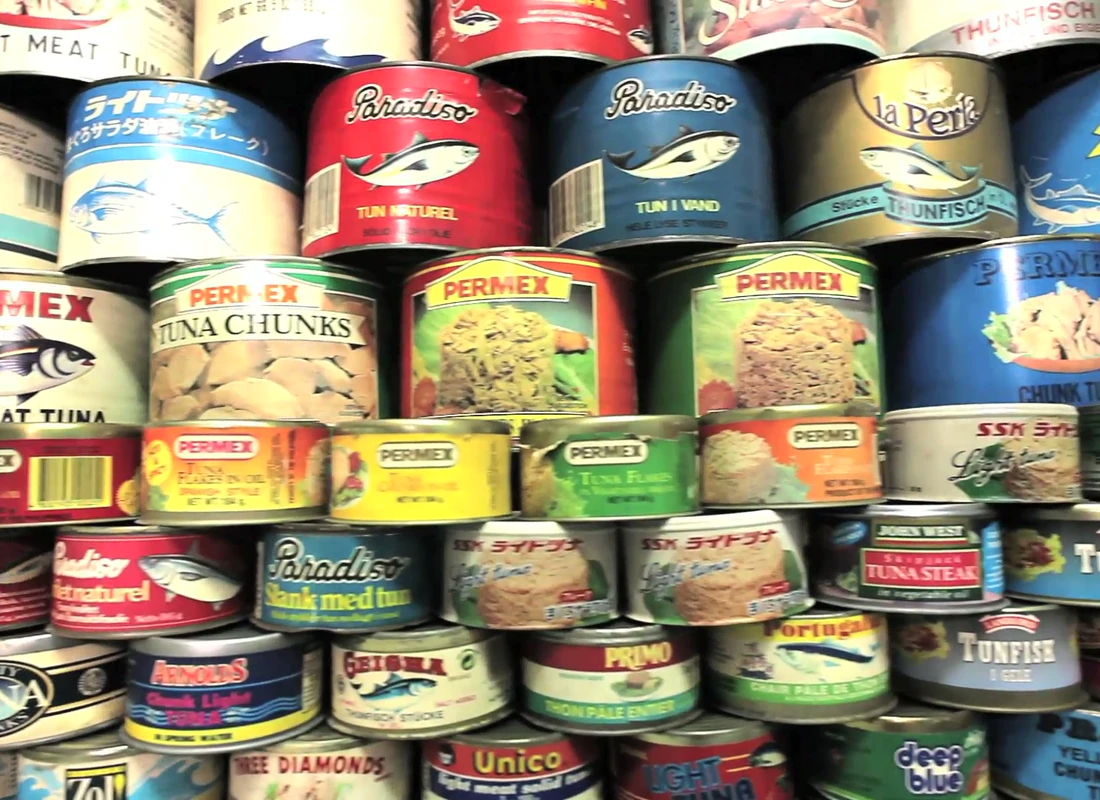 Still from Permex AVP 2015 A display of Permex and export-market canned tuna packaging, from the 2015 company film